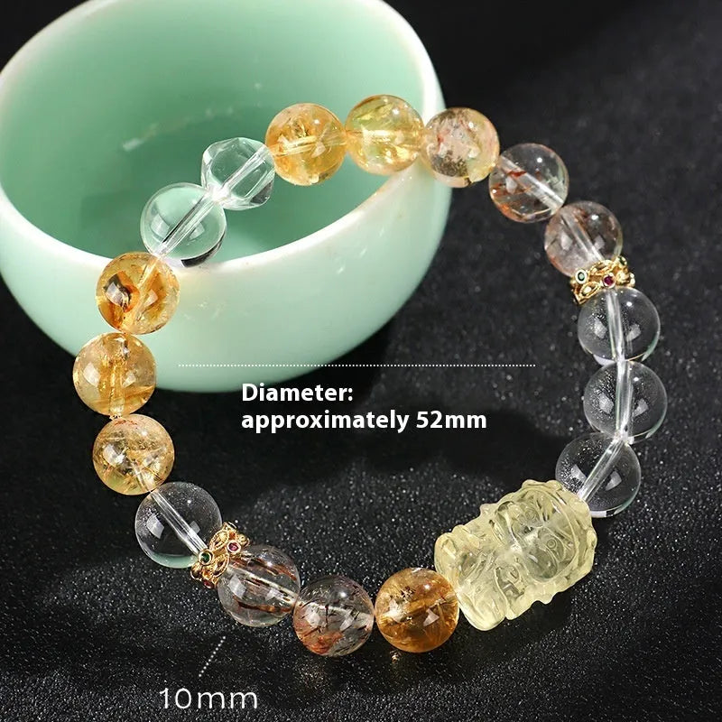 Handmade women's bracelet with white crystal beads, freshwater pearls, and yellow crystal accents