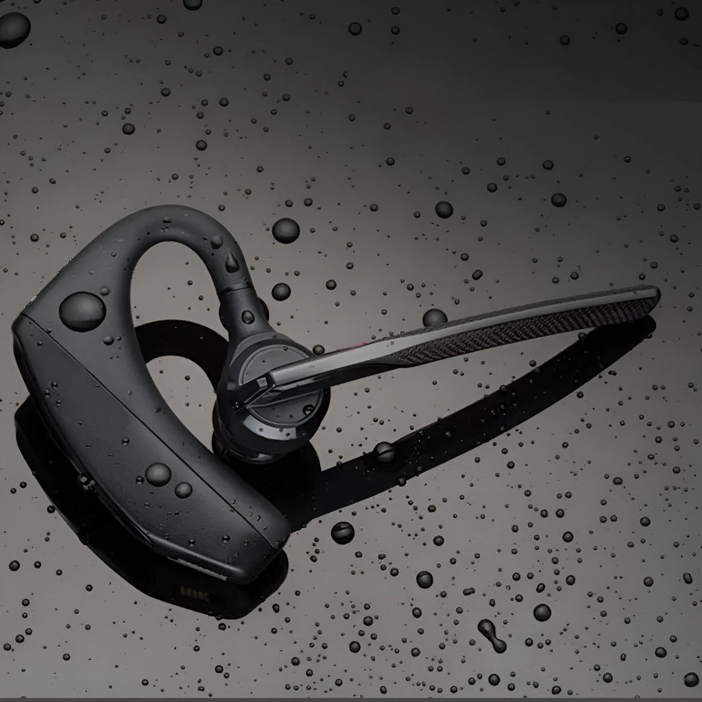Black plastic Bluetooth sports headphones showing a simple design and USB charging port.