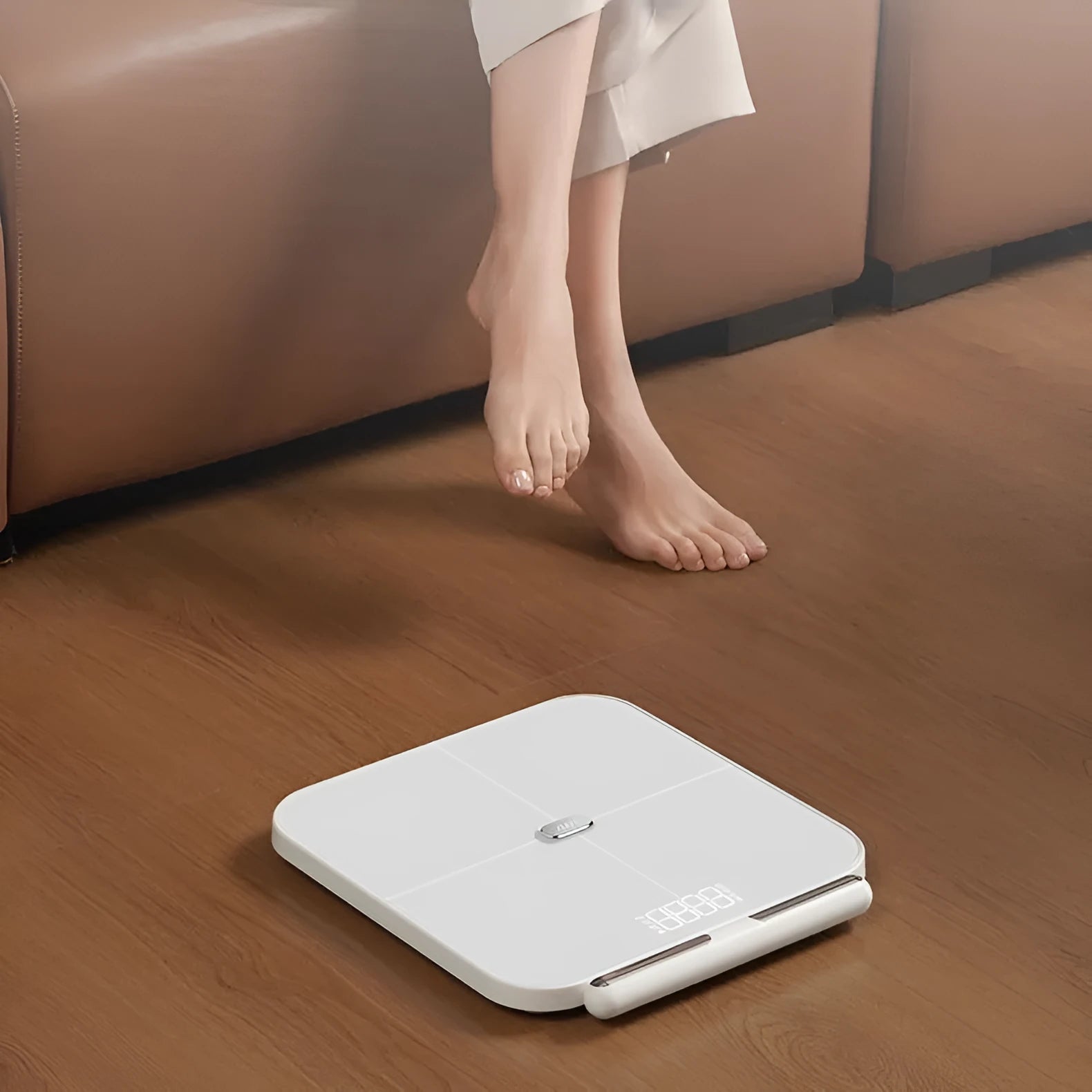 White tempered glass body fat scale with 8 electrodes and LED display showing weight measurement