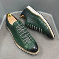 Men's low top handmade shoes with an embossed pattern, shown with front tie laces.