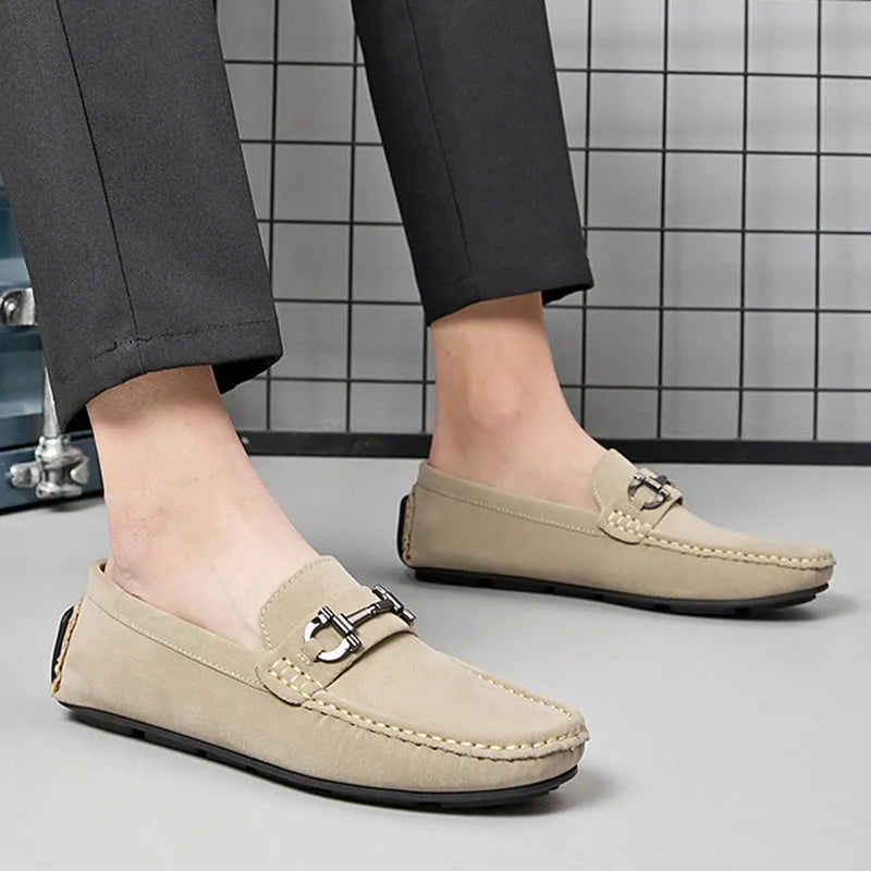 Men's beige casual slip-on shoes made from two-layer cowhide leather with a round toe and rubber sole.