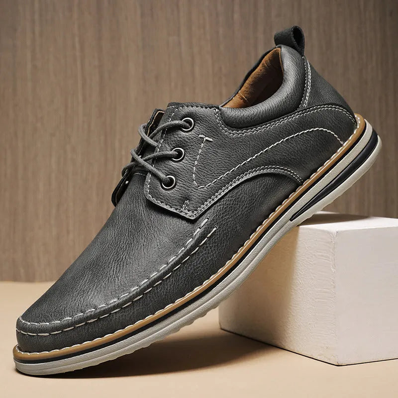 Men's black genuine leather casual shoes with round toe and lace-up front