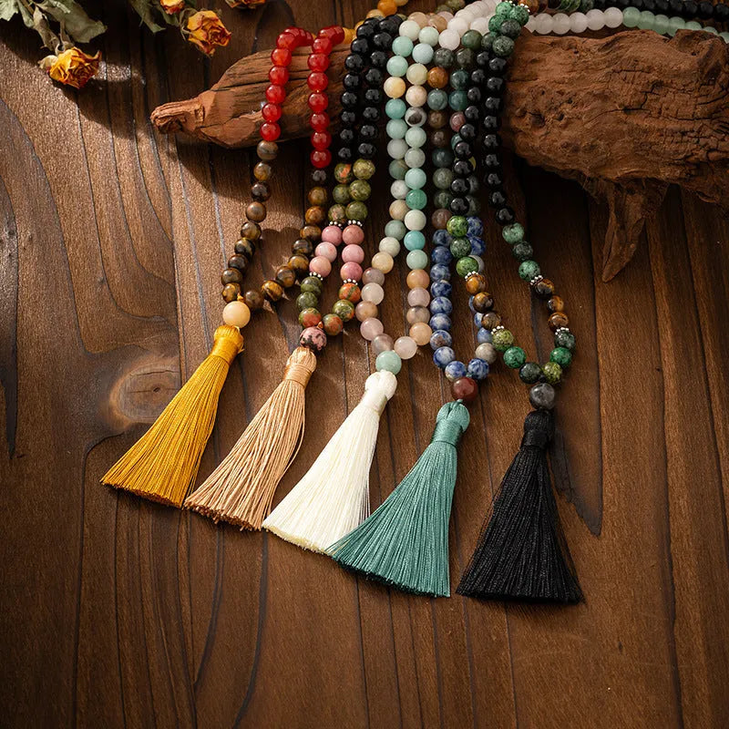 Vintage bohemian long beaded necklace and matching bracelet set with geometric round stones.