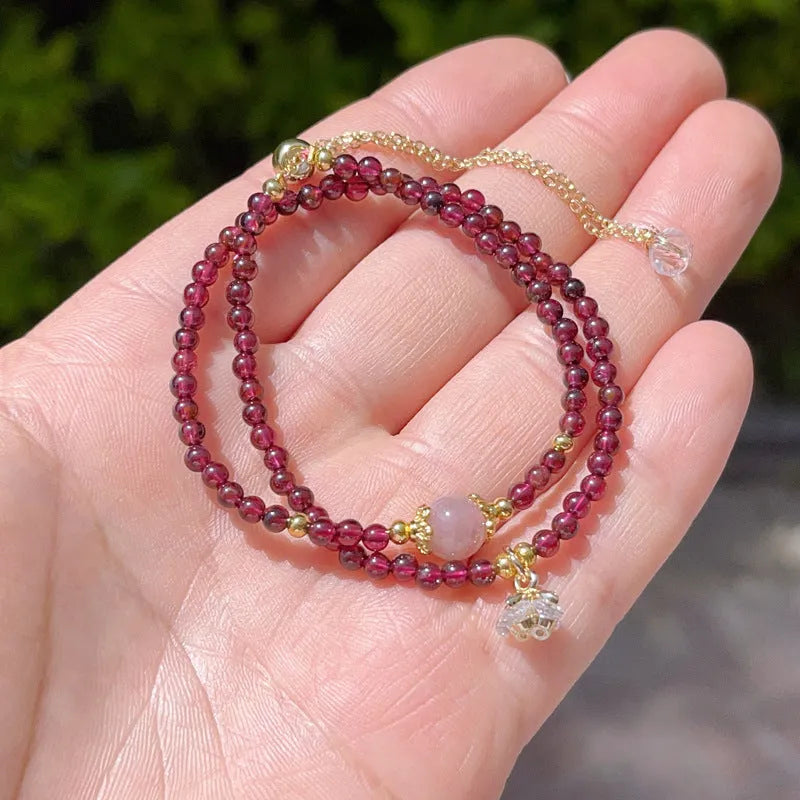 Women's natural garnet bracelet with double ring design and H311 colour garnet