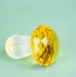 Colourful crystal mushroom decorative ornament in modern geometric style.