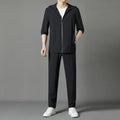Korean style loose hooded sun-protective suit in grey, blue, or black, featuring top stitching pockets.