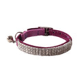 Soft flocked cat collar with elastic buckle in various colours on a white background.