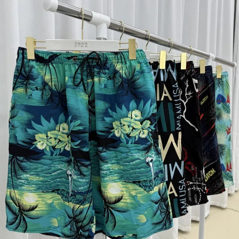 Men's ice silk beach pants with striped pattern showing loose fit and elastic waist