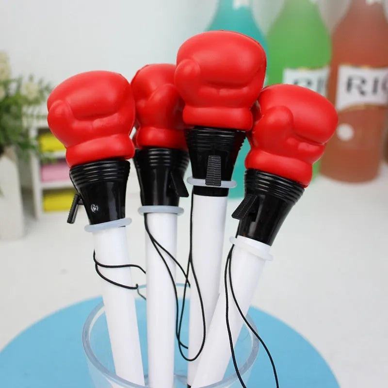 Four black pressure relief ejection pens with a plug-in sleeve fidget mechanism and 0.7mm bullet tips.