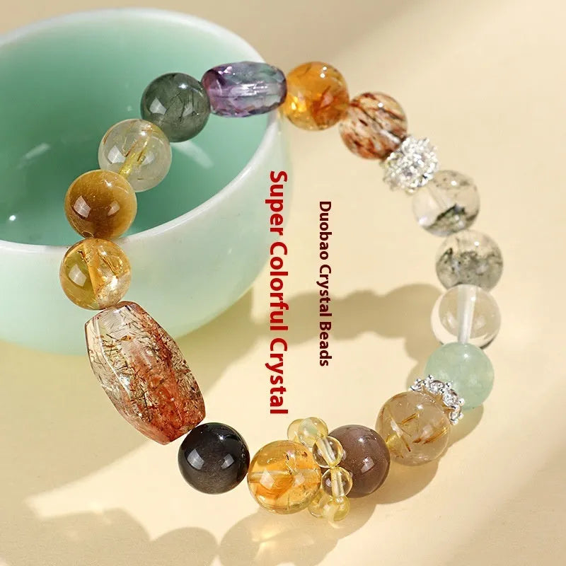 A women's bracelet featuring strands of natural Duobao crystal beads in a black and gold style.