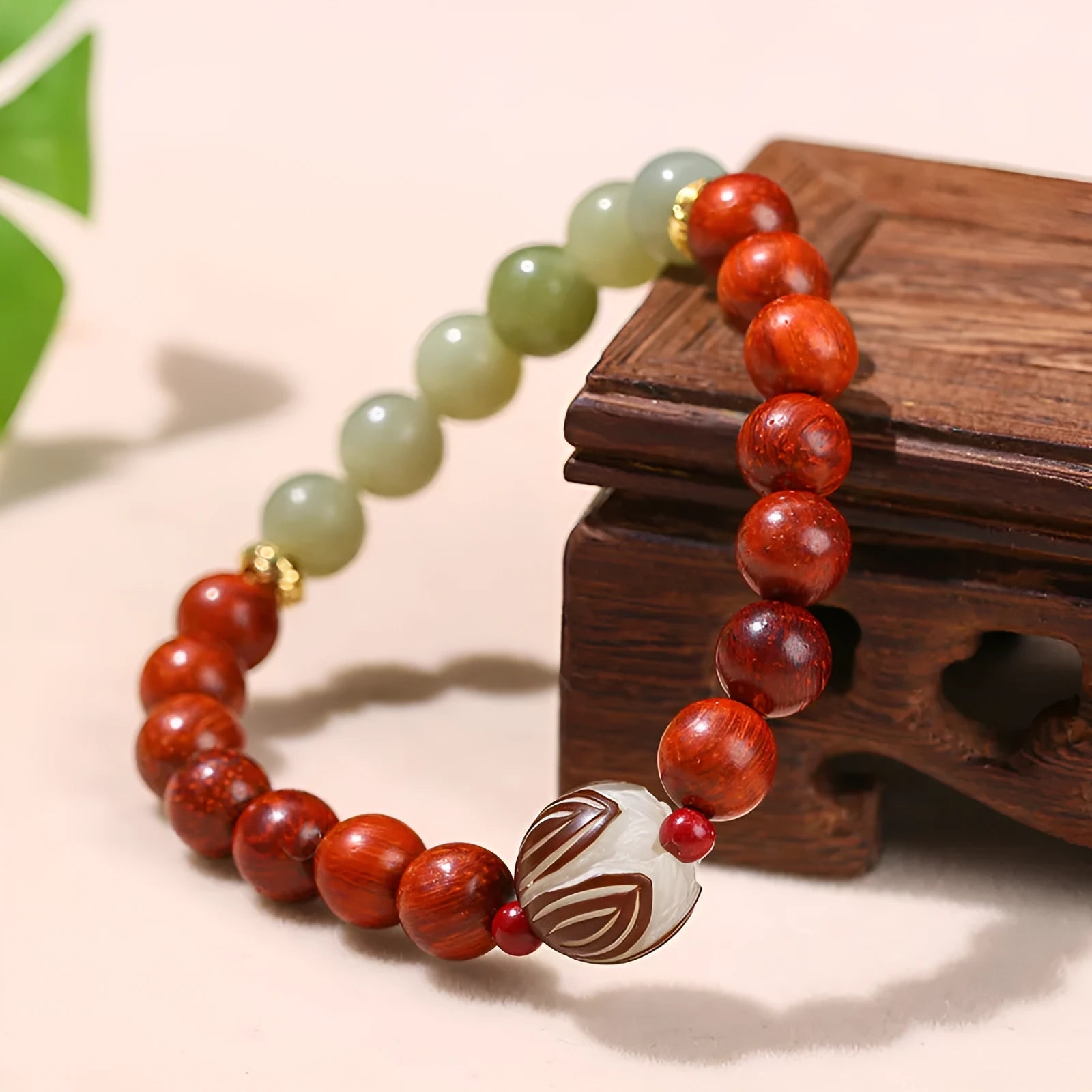 Chinese style red rosewood and gray jade bracelet with Bodhi Lotus design and 8 round beads.