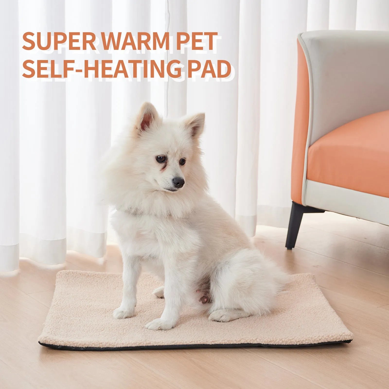 Grey self-heating plush pet pad for cats and dogs on a wooden floor.