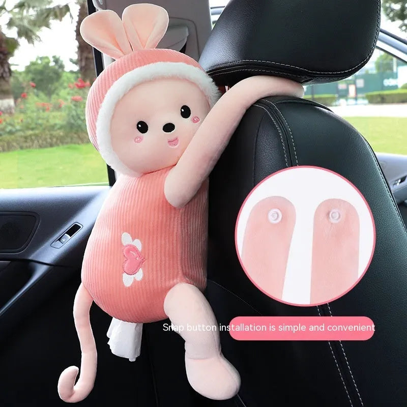 Plush car seat tissue holder with strap attached to vehicle seat back in animal design