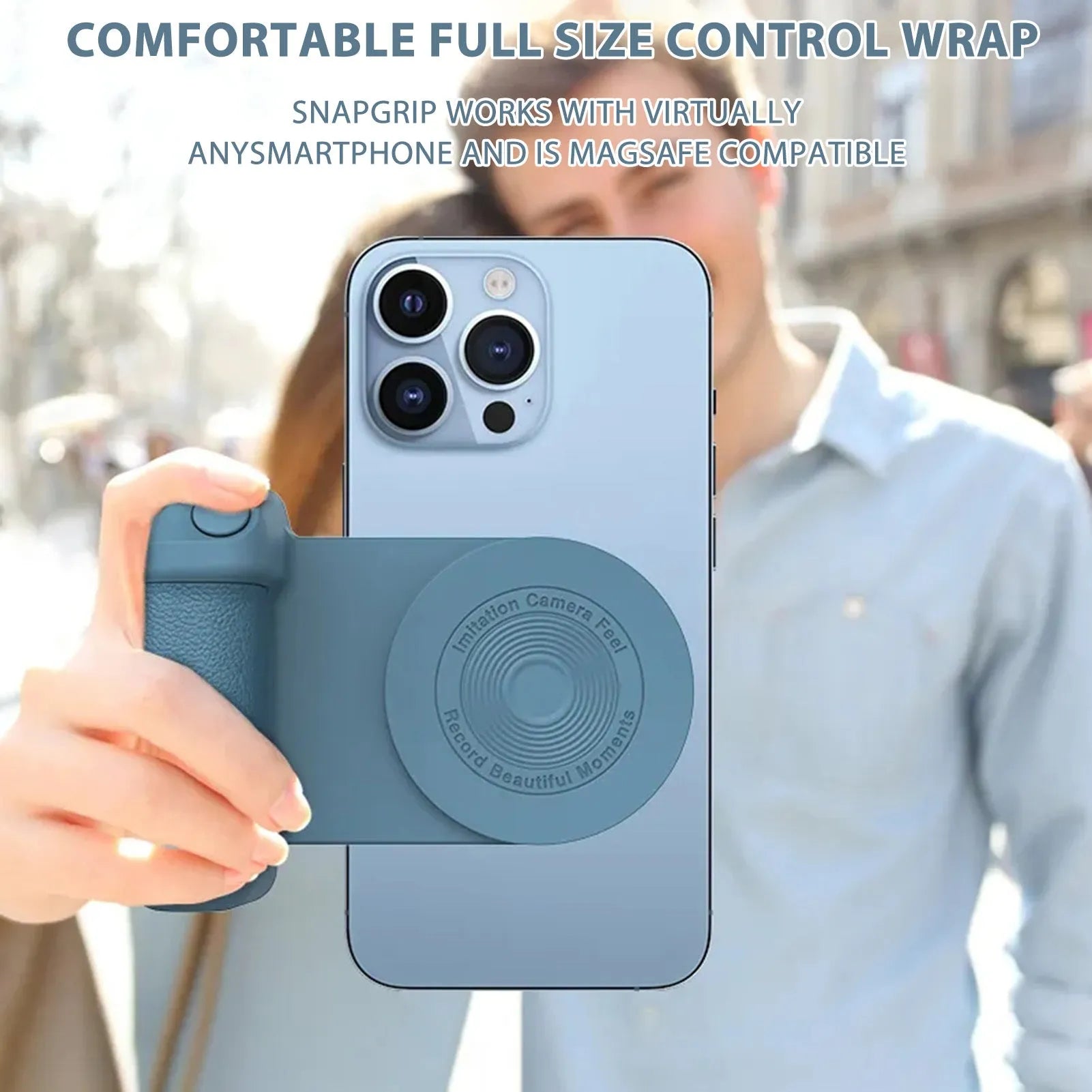 Black magnetic phone camera grip holder with rotatable bracket on a table.