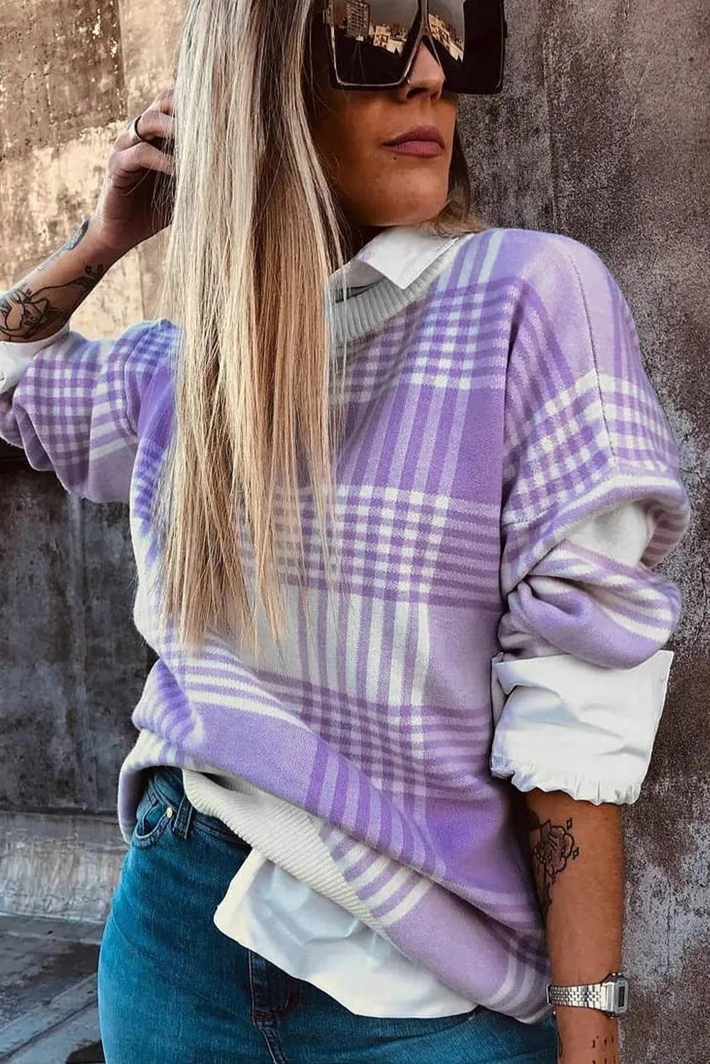 Lilac plaid print loose long-sleeved sweater with ribbed trim on cuffs and hem.
