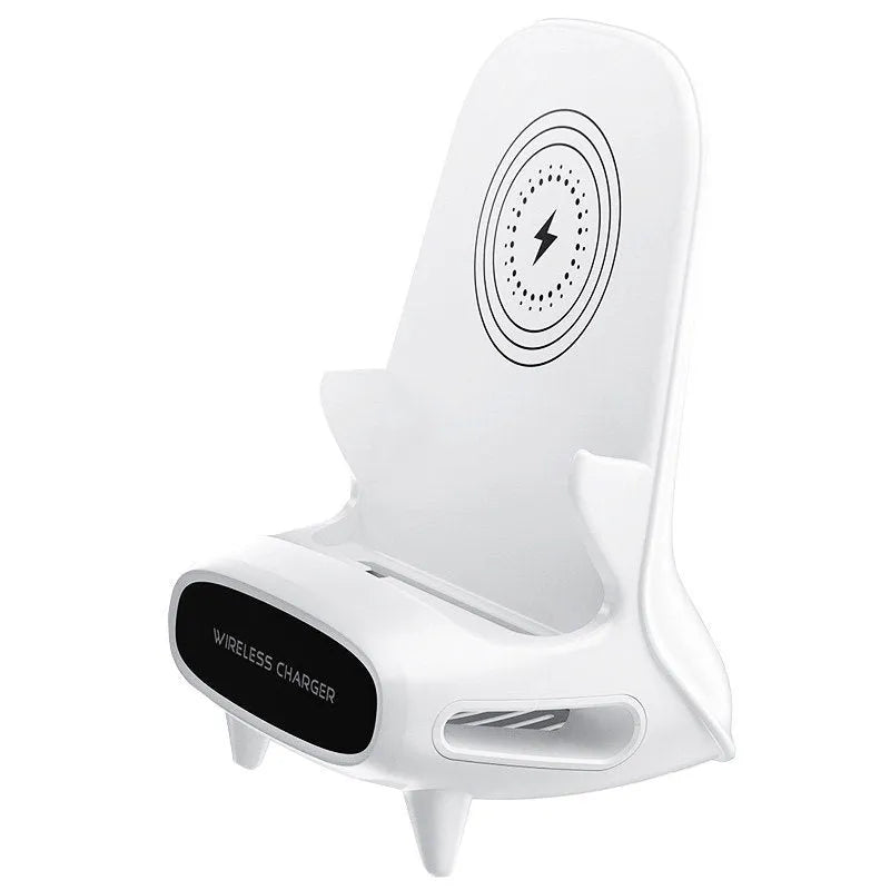 White mini chair shaped wireless charging stand holding a mobile phone at an angle