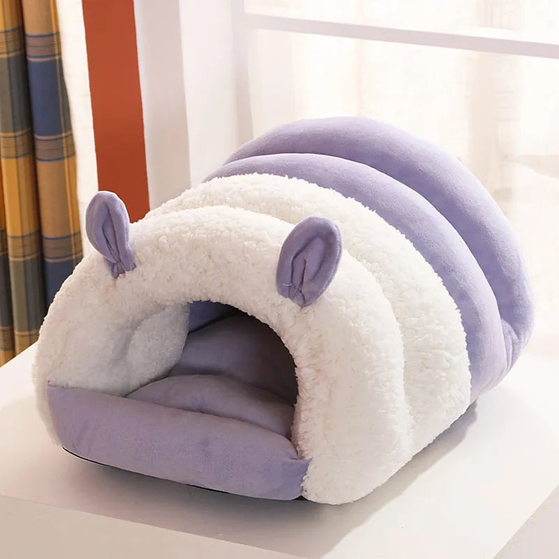 Blue enclosed cat nest with a soft fleece interior and a removable cushion, shown next to a ruler indicating its 40cm by 50cm size.