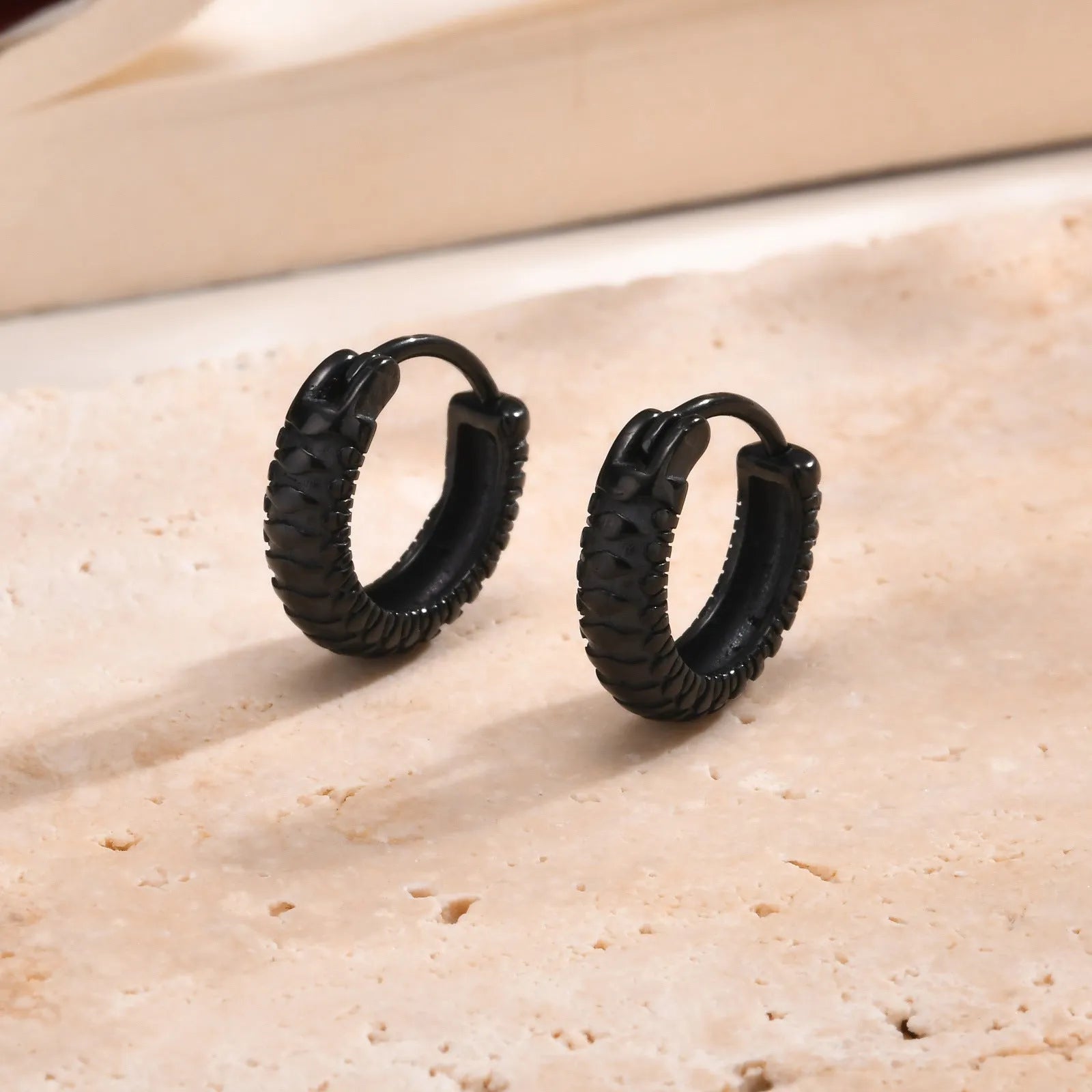 Men's stainless steel hip hop ear rings with snake pattern design in black and gold colour options