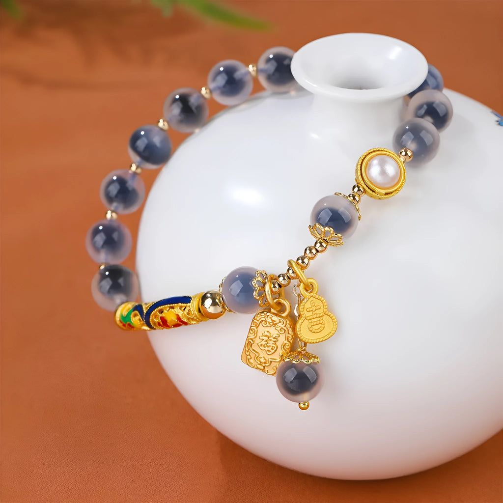 Handmade sugar heart agate bracelet in retro ethnic style with cherry blossom, peach blossom, and ping an pendant designs.