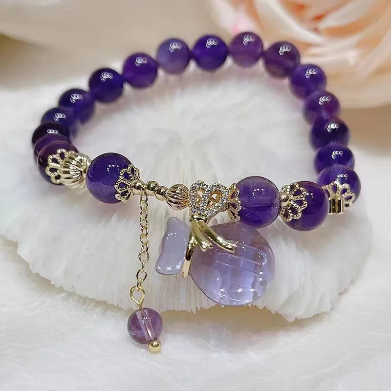 Purple amethyst bracelet with money bag pendant and adjustable cord