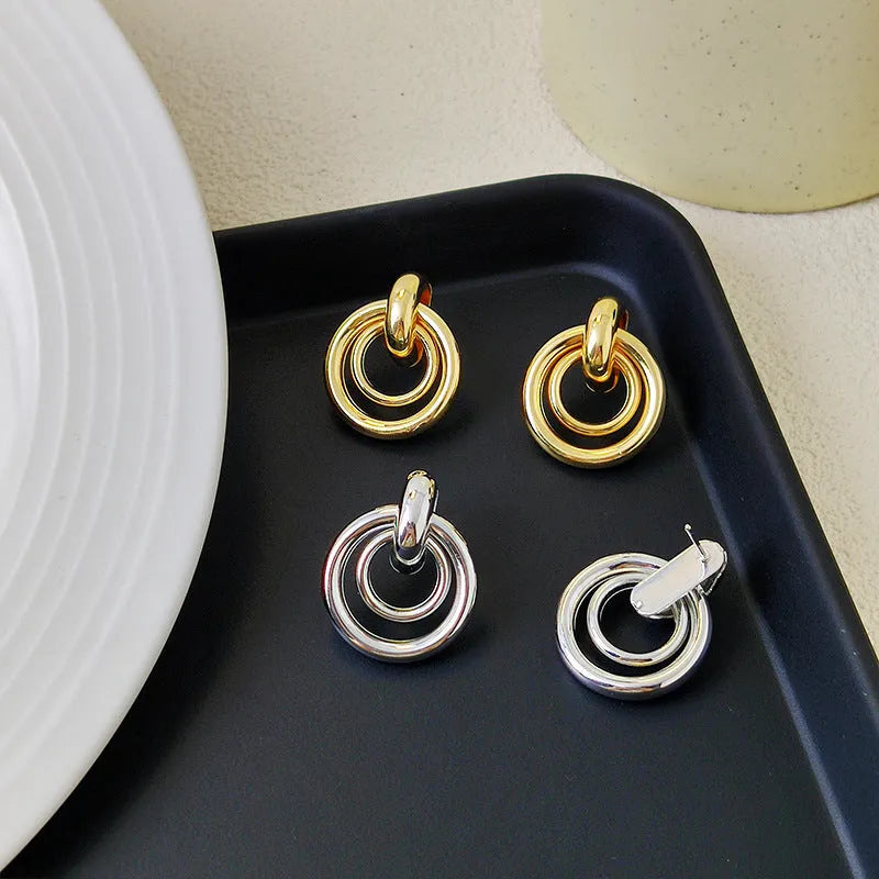 Geometric round ring earrings with irregular design in gold or silver electroplated finish