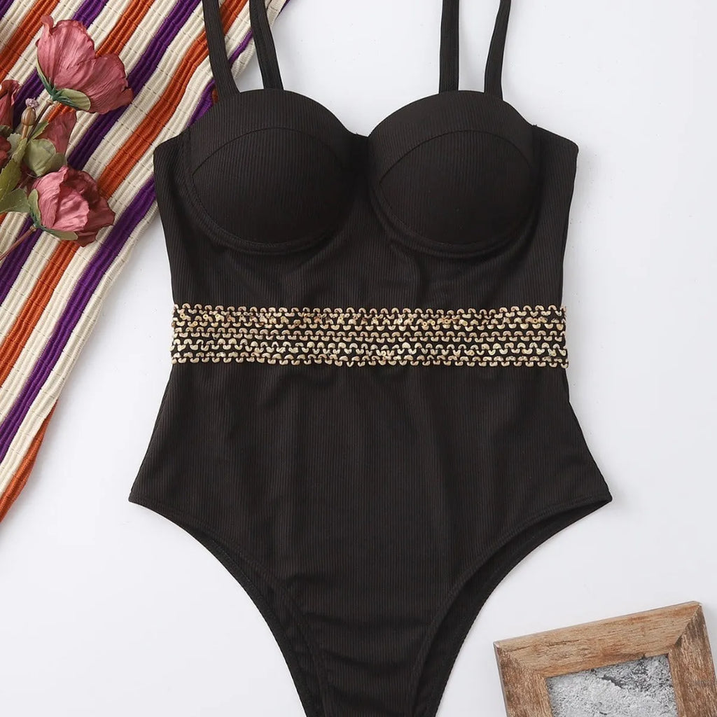 Black women's one-piece swimsuit with an adjustable shoulder strap on a mannequin