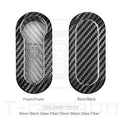 Carbon fibre and glass fibre replacement shell for car key fob on keyring.