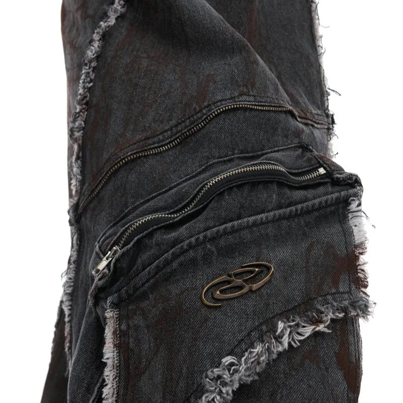 Distressed black denim coat with padded shoulders, gradient splash-dye pattern and matching trousers laid flat