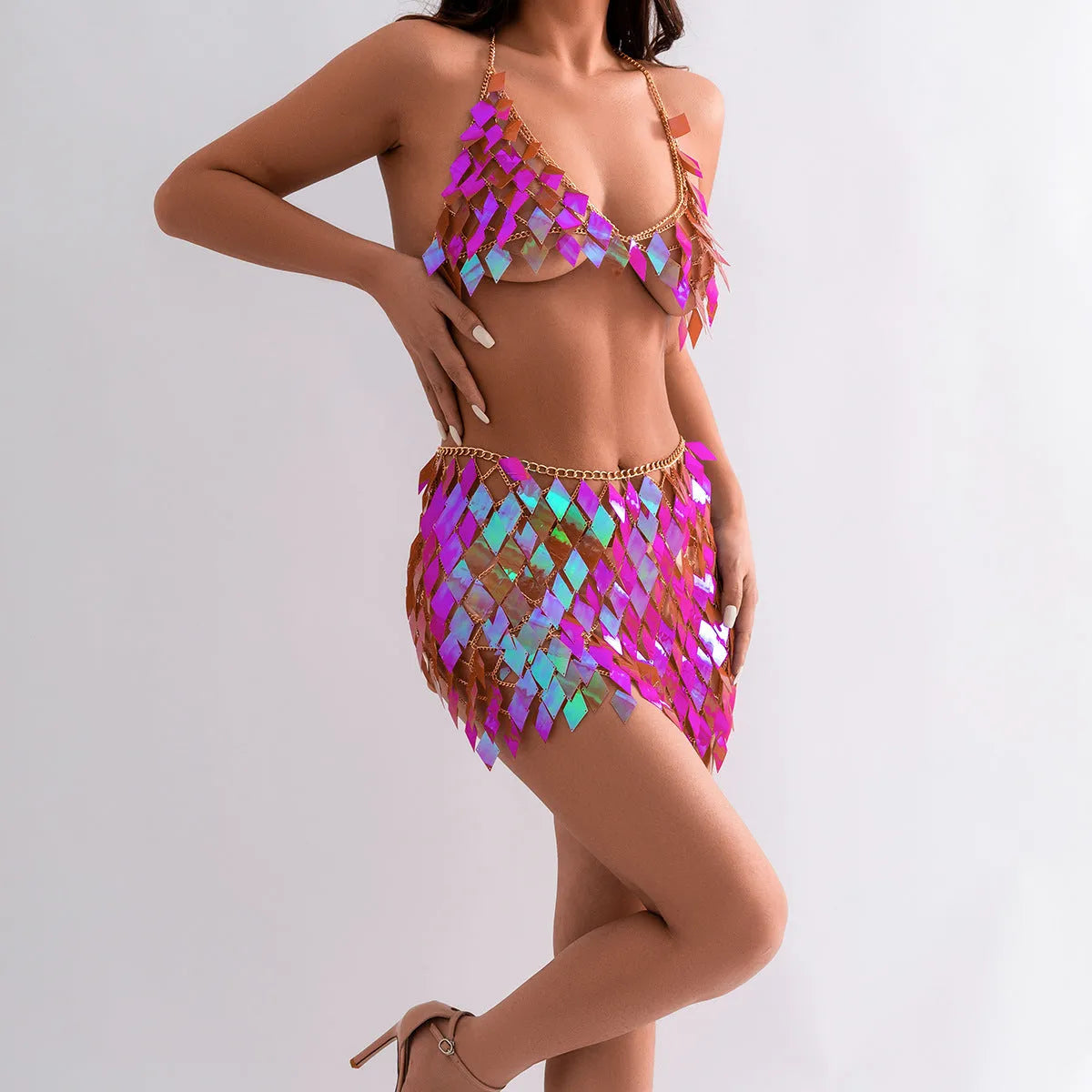 Women's geometric plastic body chain set in orange with electroplated finish on a white background