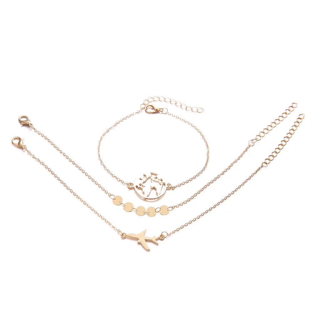 Three bohemian aircraft map charm bracelets with heart-shaped alloy charms in electroplated finish