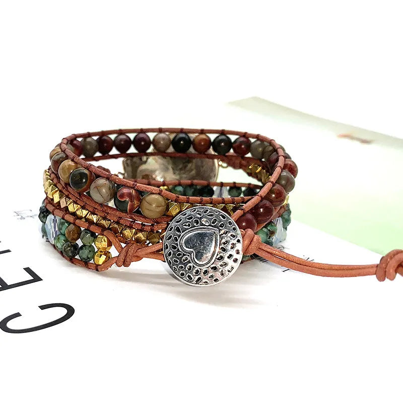 Natural stone bohemian conch bracelet in picture colour on a light background