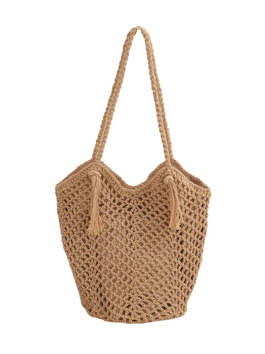 Handmade cotton thread woven hollow shoulder bag with tassel in creamy-white, vertical square shape, open pocket