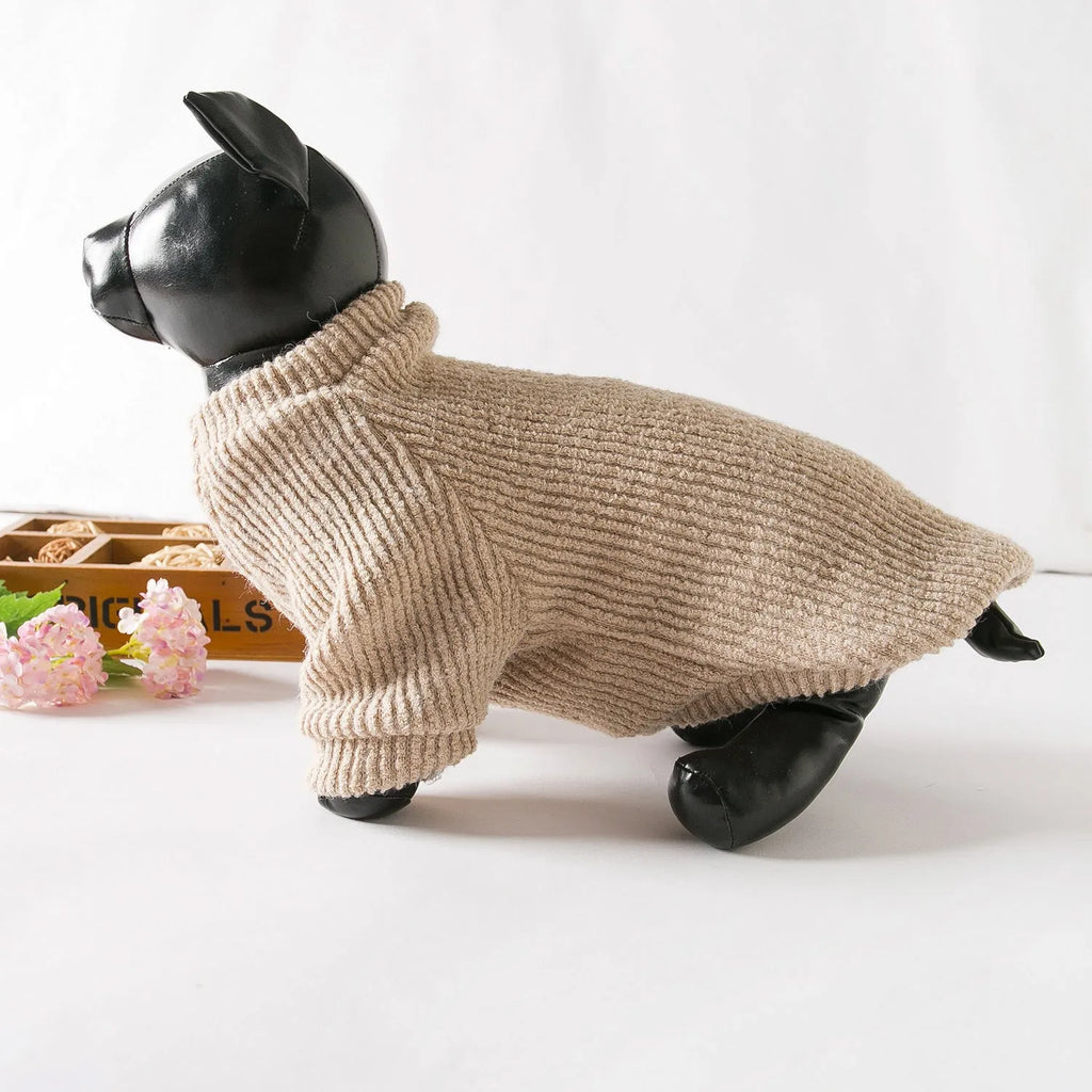 Brown knitted pullover sweater on a small dog, showing casual cloth design.