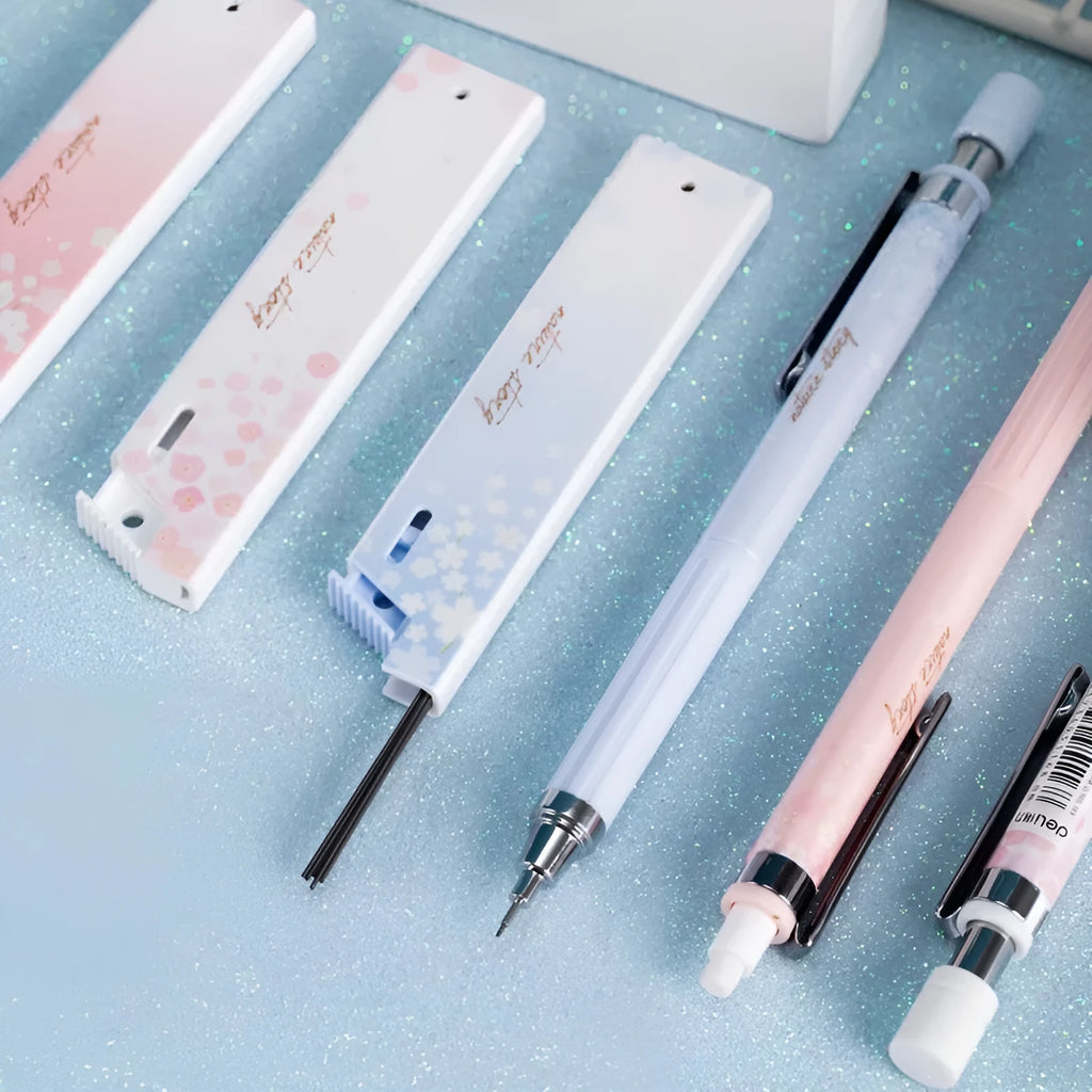 Mixed colour cartoon automatic pencil set with three 0.5mm pencils and HB refill boxes.