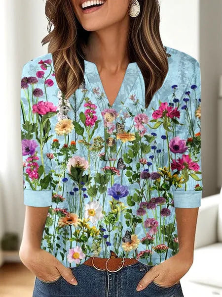 Women's loose-fit casual V-neck top with a colourful 3D pattern print.