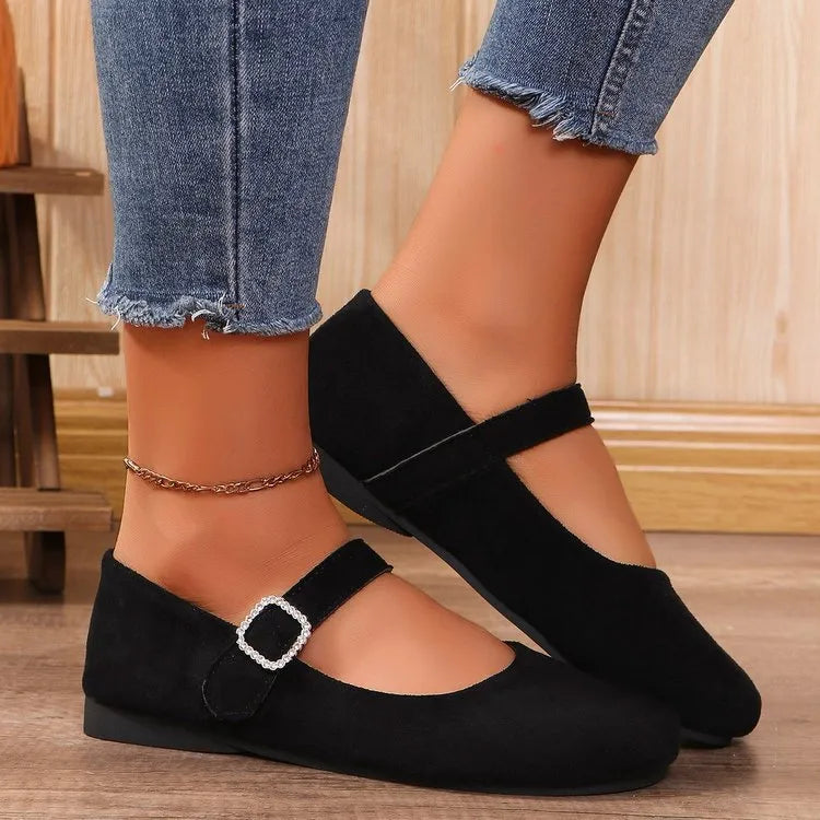 Black canvas fisherman shoes with flat rubber soles shown in adult sizes