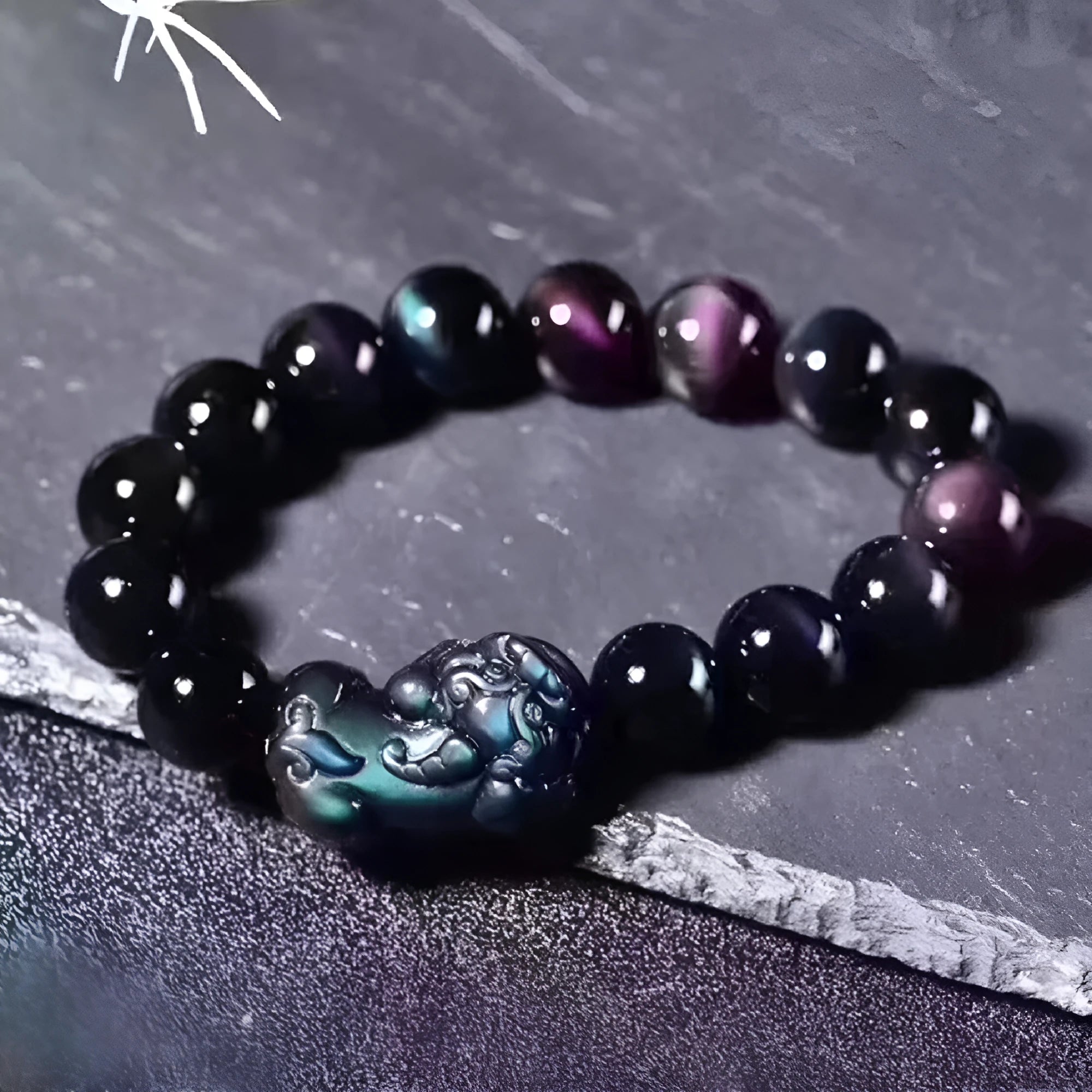 Natural eye obsidian bracelet with grey and black banding, showing multiple bead size options