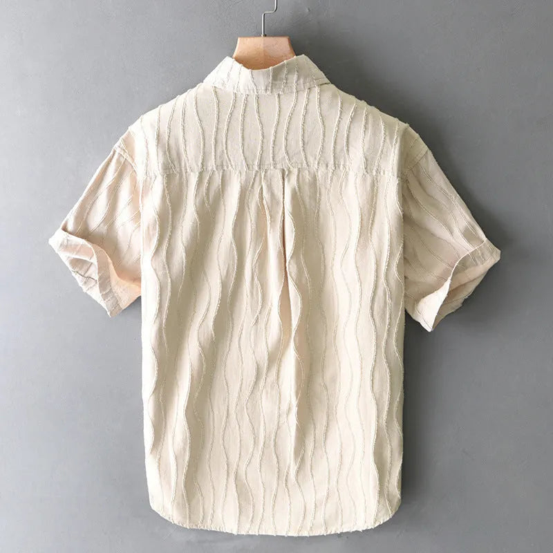 Men's apricot pure cotton casual shirt with short sleeves and a loose fit.