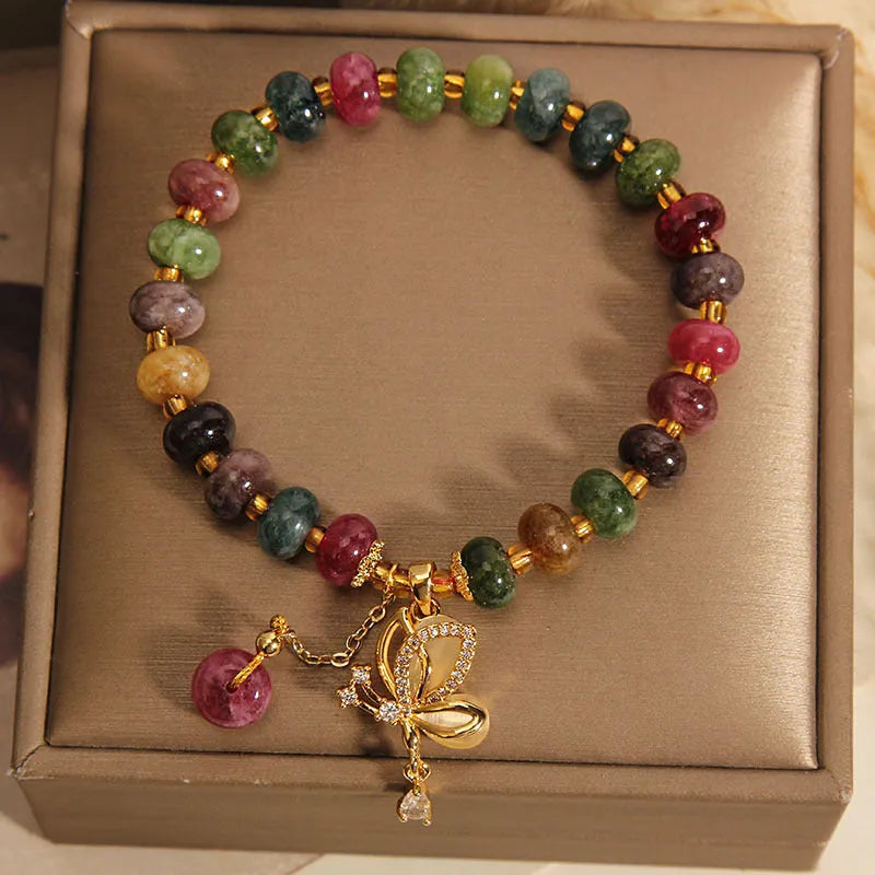 Colourful women's butterfly bracelet with tourmaline beads on alloy construction