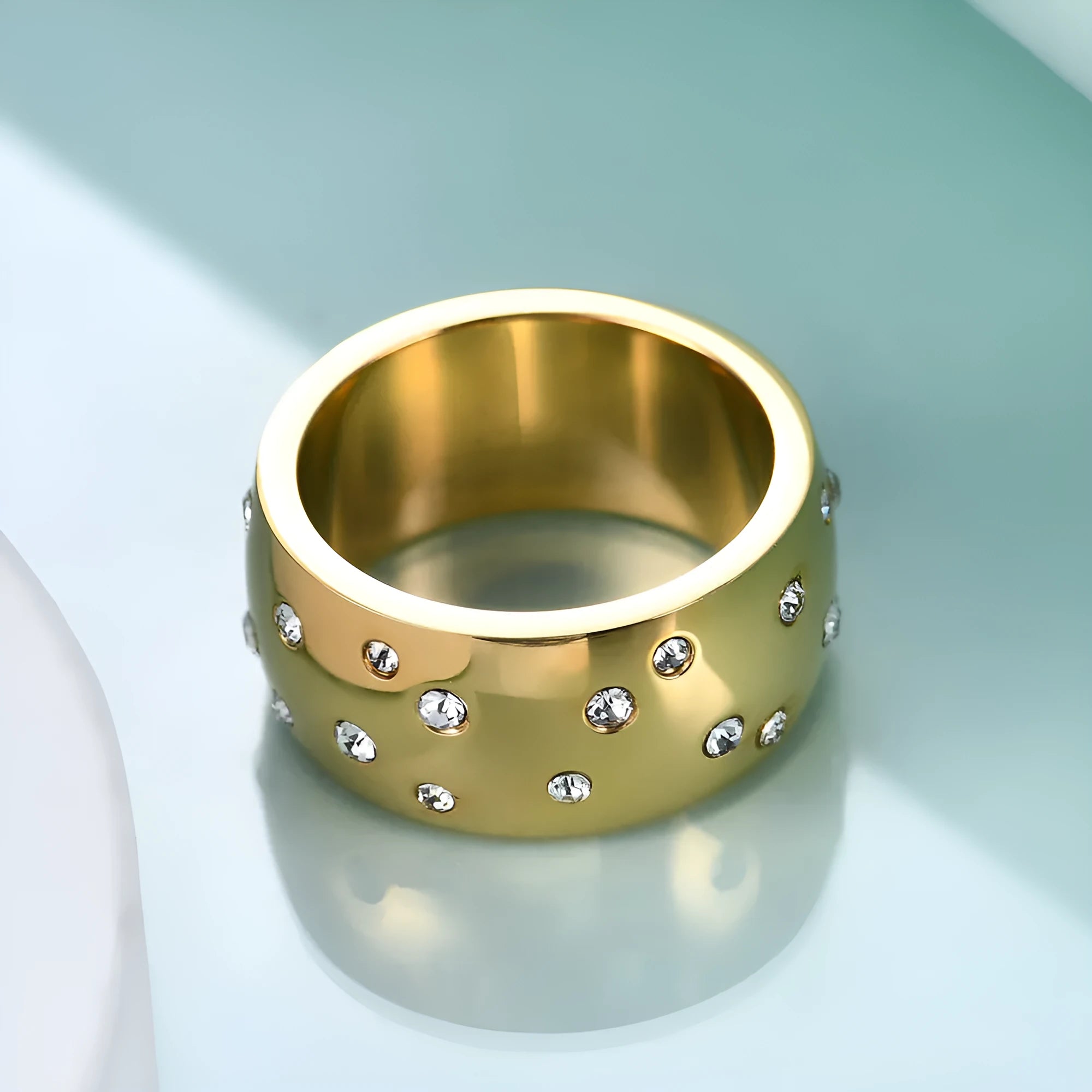 Geometric titanium steel women's couple ring with starry diamond treatment in black, gold, rose gold, and steel.