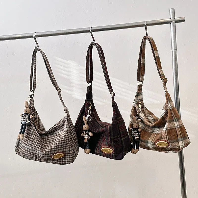 Women's large soft wool crossbody shoulder bag in a horizontal square shape, shown in red, khaki, and brown colour options.