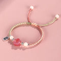 Red cat's paw woven bracelet for couples with glass charm in pastoral style