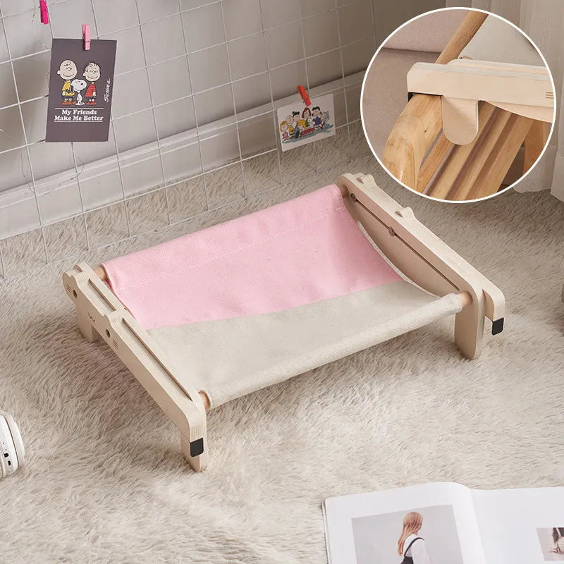 Solid wooden cat bed with removable fabric cover in selected colour option
