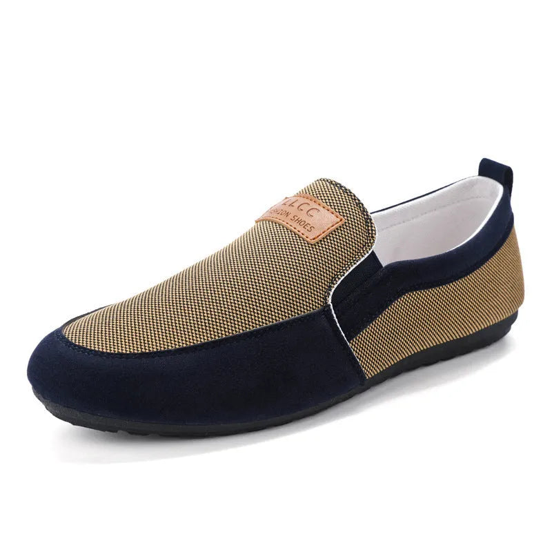 Men's grey and khaki canvas slip-on board shoes with round toe and rubber sole.