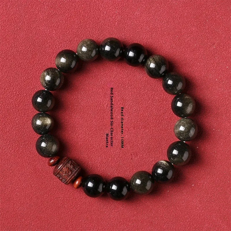 Golden obsidian vintage bracelet with hand-woven construction and national style design elements