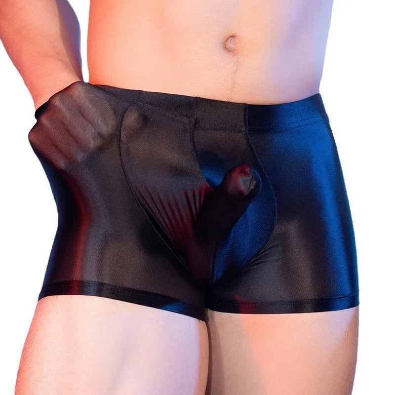 Men's seamless nylon boxer shorts in red with an elephant nose pattern, showing mid-waist fit.