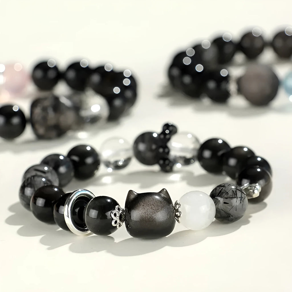 Silver stone crystal beaded bracelet with electroplated setting and choice of fox, cat or planet pendant