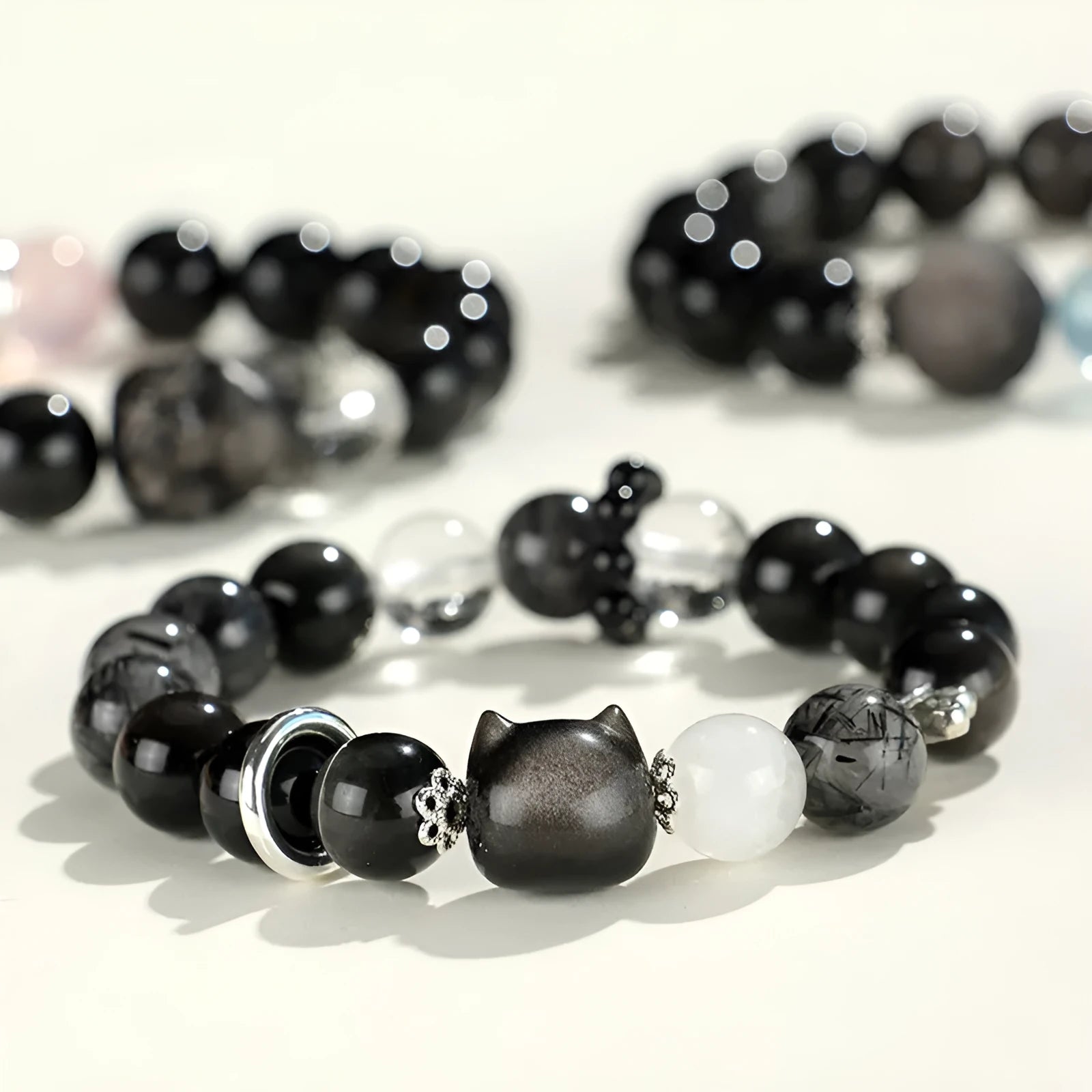 Silver stone crystal beaded bracelet with electroplated setting and choice of fox, cat or planet pendant