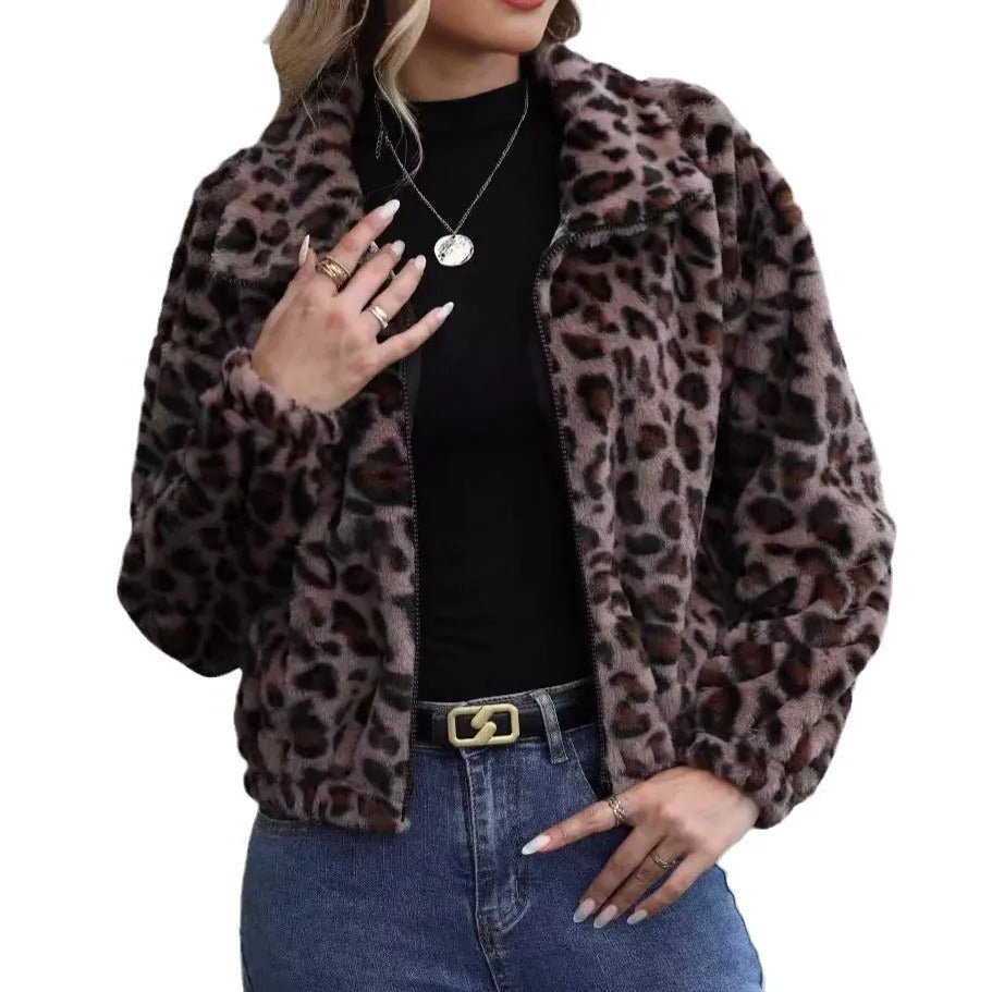 Women's loose leopard print plush coat with zip front and raglan sleeves.