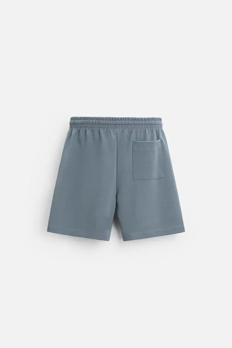 Men's loose fit round collar short sleeve top and matching shorts casual set in blue.